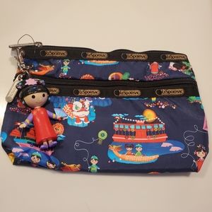 HTF Lesportsac Disney It's A Small World Hong Kong Day and Night Cosmetic Clutch